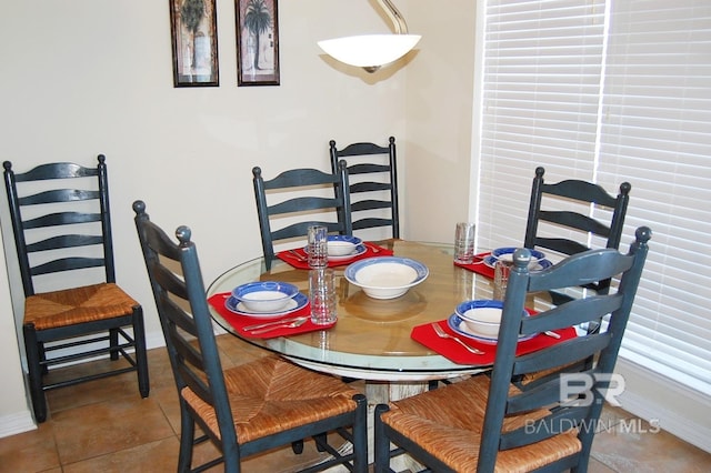 dining room with light tile patterned floors