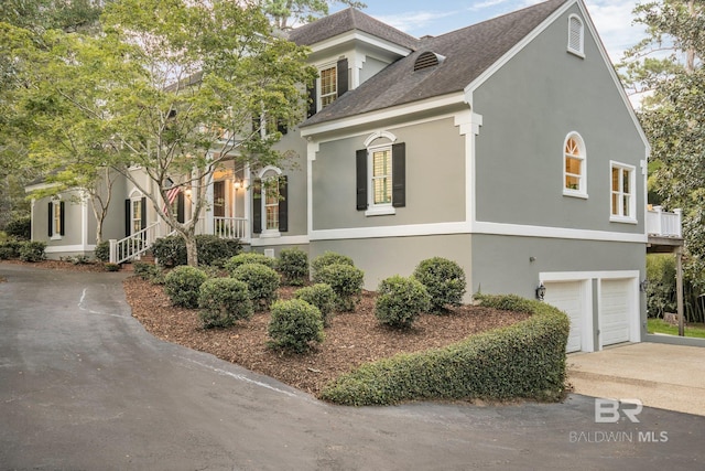 view of front of property featuring a garage