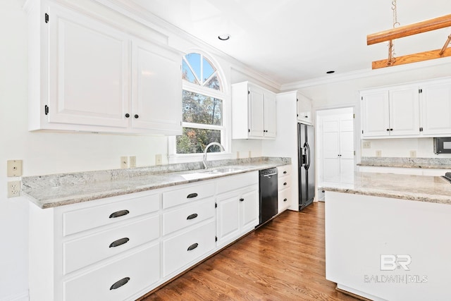 kitchen featuring light stone countertops, fridge with ice dispenser, black dishwasher, light hardwood / wood-style floors, and white cabinetry