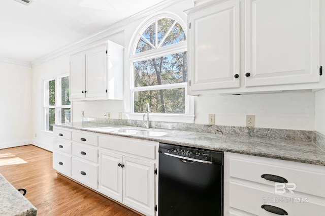 kitchen with dishwasher, light stone countertops, white cabinetry, and sink