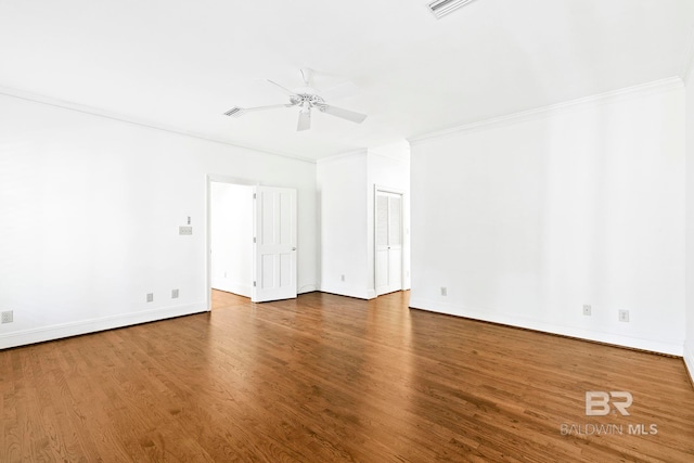 unfurnished living room featuring ceiling fan, hardwood / wood-style floors, and ornamental molding