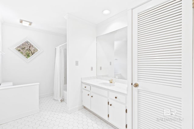 bathroom with tile patterned flooring, vanity, shower / bath combination with curtain, and ornamental molding