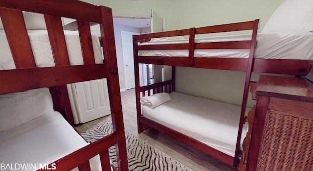 bedroom with light hardwood / wood-style flooring