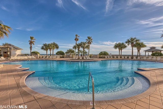 view of pool featuring a patio