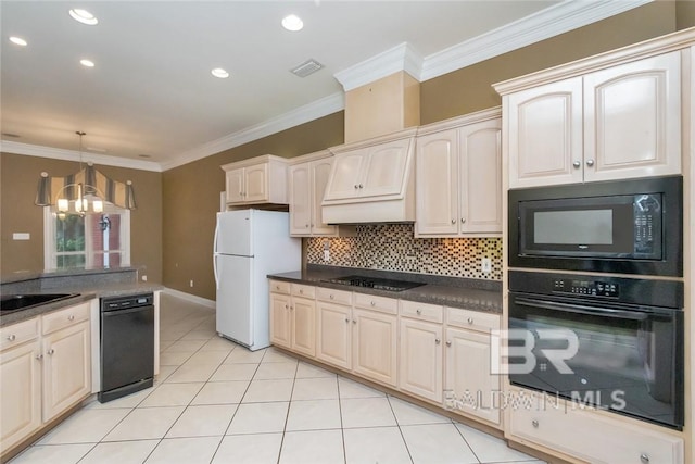 kitchen with pendant lighting, crown molding, a chandelier, black appliances, and light tile patterned flooring