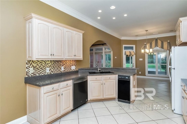 kitchen featuring white fridge, dishwasher, a notable chandelier, kitchen peninsula, and sink