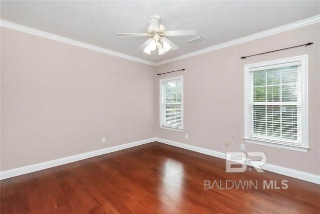 unfurnished room featuring ceiling fan, ornamental molding, and dark hardwood / wood-style flooring