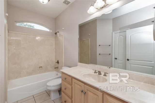 full bathroom featuring tile patterned flooring, toilet, washtub / shower combination, and vanity