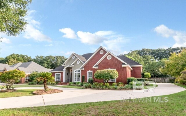 view of front of home with a front lawn