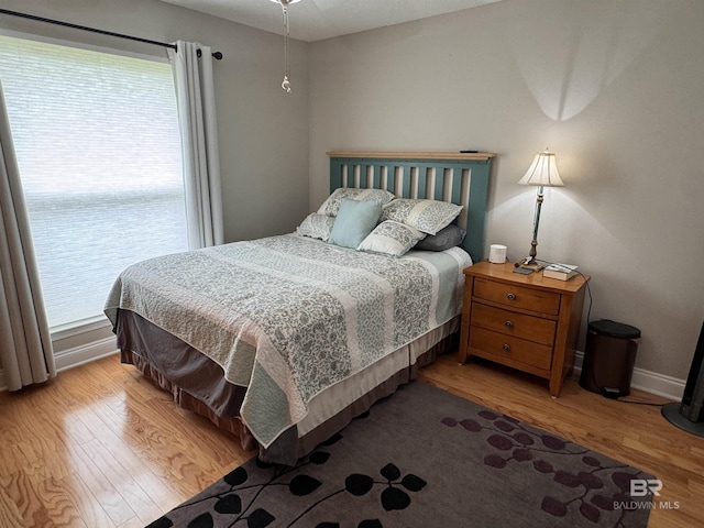 1052 Orlando Dr, Foley, AL 36535 - bedroom featuring wood finished floors and baseboards