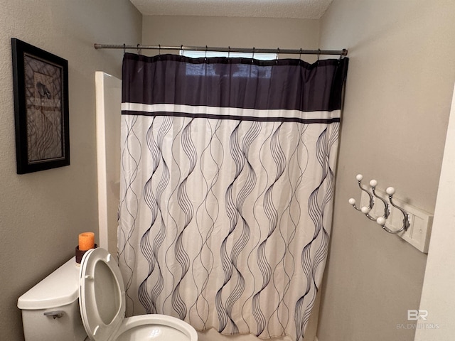 1052 Orlando Dr, Foley, AL 36535 - full bathroom featuring toilet and a shower with shower curtain