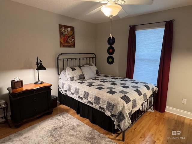 1052 Orlando Dr, Foley, AL 36535 - bedroom featuring light wood-style floors, baseboards, and a ceiling fan