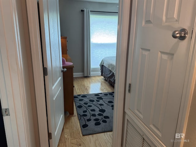 1052 Orlando Dr, Foley, AL 36535 - hallway with light wood-style floors and baseboards