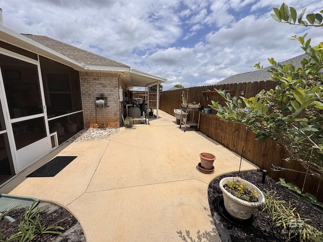 1052 Orlando Dr, Foley, AL 36535 - fenced backyard featuring a patio area