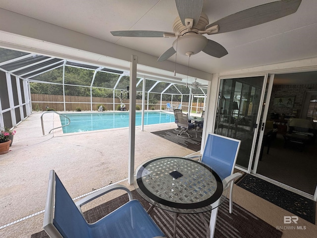 1052 Orlando Dr, Foley, AL 36535 - view of swimming pool with a patio area, glass enclosure, and ceiling fan