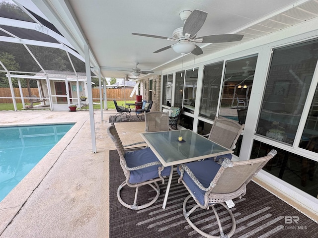 1052 Orlando Dr, Foley, AL 36535 - view of swimming pool featuring a fenced backyard, outdoor dining space, a patio, and a ceiling fan