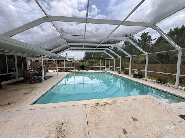 1052 Orlando Dr, Foley, AL 36535 - view of swimming pool with a fenced backyard, a patio, ceiling fan, and glass enclosure