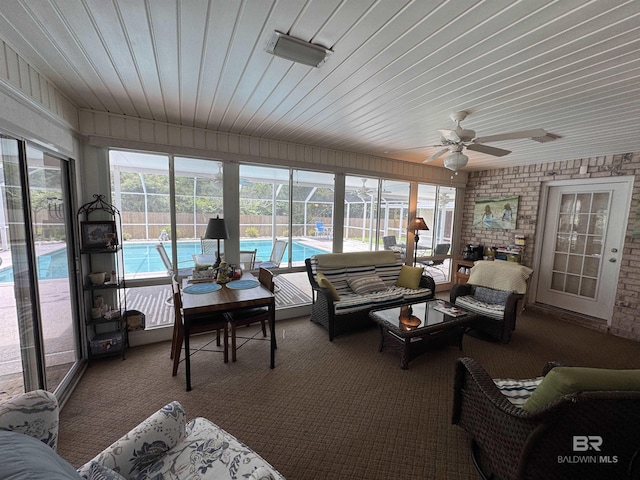 1052 Orlando Dr, Foley, AL 36535 - sunroom / solarium with healthy amount of natural light, carpet flooring, and wooden ceiling