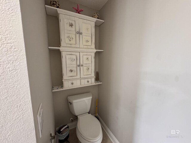 1052 Orlando Dr, Foley, AL 36535 - bathroom with toilet and a textured ceiling