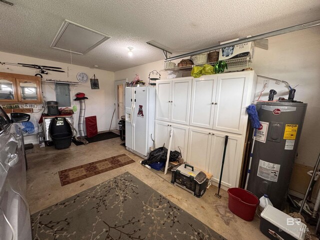 1052 Orlando Dr, Foley, AL 36535 - garage featuring white fridge with ice dispenser and electric water heater