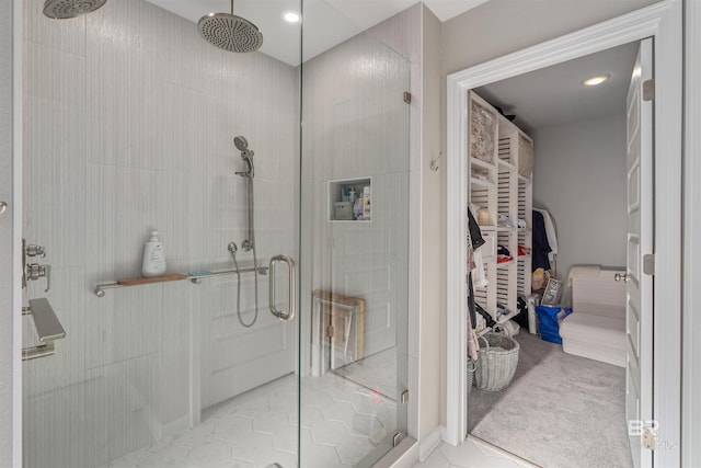 bathroom featuring tile patterned flooring and walk in shower