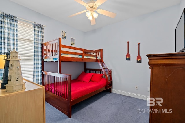 6065 Sawgrass Dr, Gulf Shores, AL 36542 - bedroom with ceiling fan, dark carpet, and baseboards