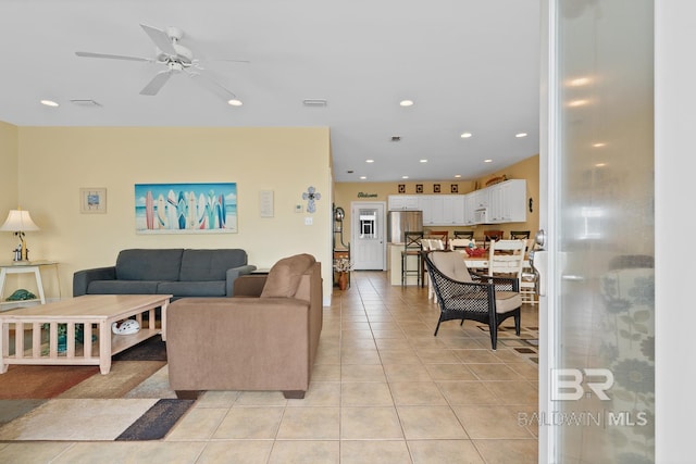 6065 Sawgrass Dr, Gulf Shores, AL 36542 - living room with a ceiling fan, recessed lighting, visible vents, and light tile patterned floors