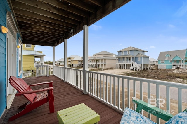 6065 Sawgrass Dr, Gulf Shores, AL 36542 - view of wooden balcony featuring a residential view and a deck