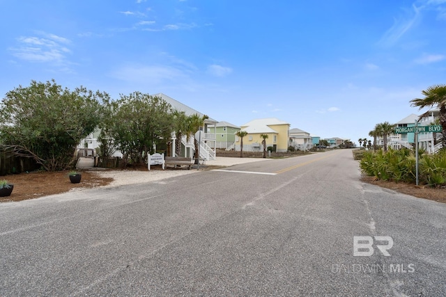 6065 Sawgrass Dr, Gulf Shores, AL 36542 - view of road with stairway and a residential view