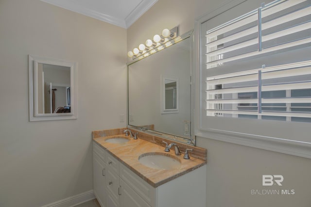 bathroom featuring vanity and ornamental molding