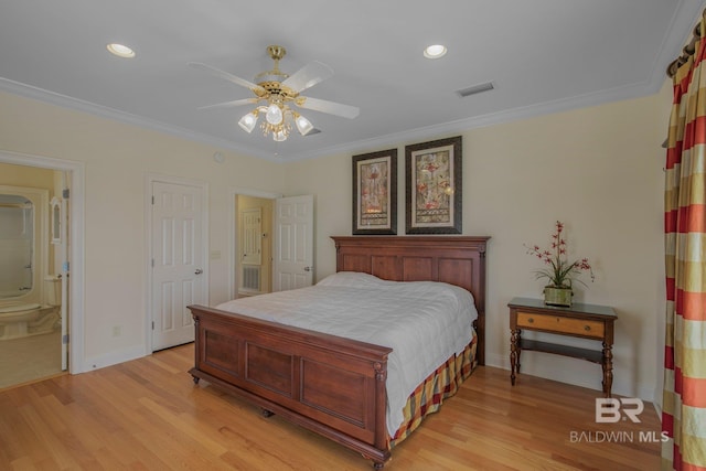 bedroom with ornamental molding, light wood-type flooring, and ceiling fan