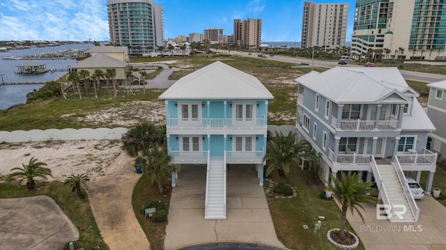 drone / aerial view with a water view