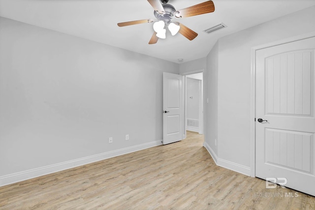 28165 Turkey Branch Dr, Daphne, AL 36526 - unfurnished bedroom featuring light wood finished floors, baseboards, and ceiling fan