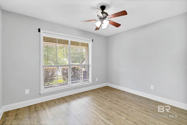 28165 Turkey Branch Dr, Daphne, AL 36526 - unfurnished room with baseboards, wood finished floors, and a ceiling fan