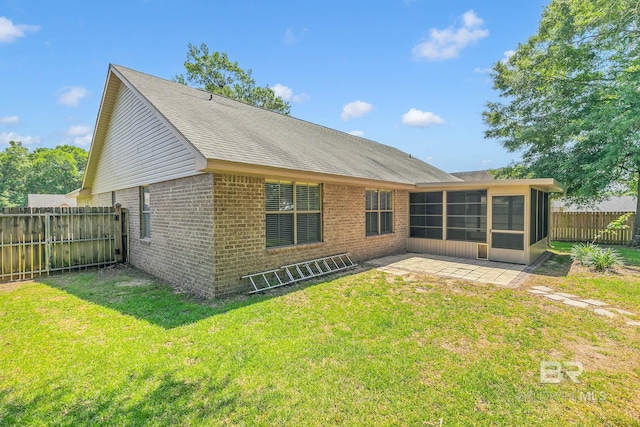 28165 Turkey Branch Dr, Daphne, AL 36526 - back of property with brick siding, a sunroom, and a patio area