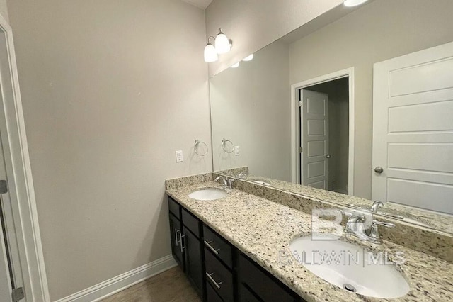 31820 Calder Ct, Spanish Fort, AL 36527 - bathroom with baseboards and double vanity