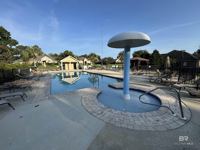 31820 Calder Ct, Spanish Fort, AL 36527 - community pool featuring a patio