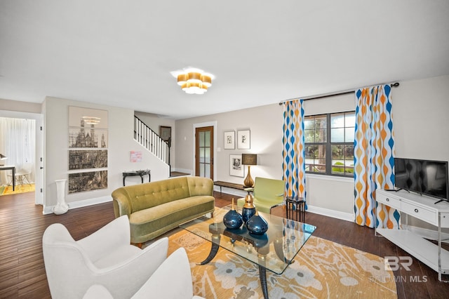 living room featuring dark wood-type flooring