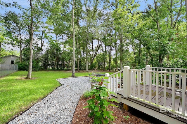 view of yard featuring a wooden deck