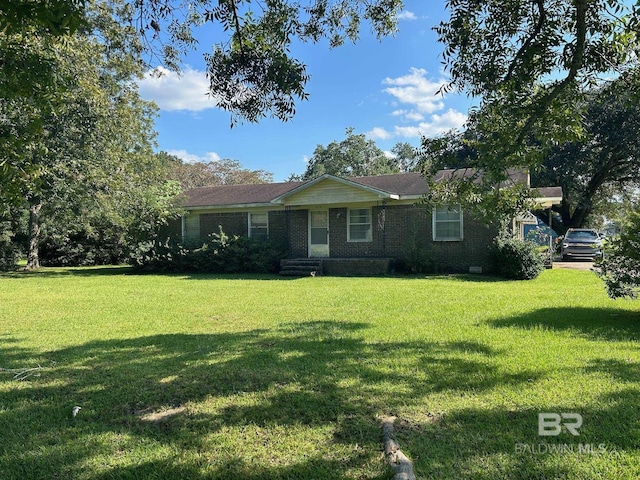 single story home with a front yard