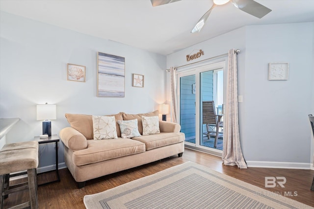 living room featuring a ceiling fan, wood finished floors, and baseboards