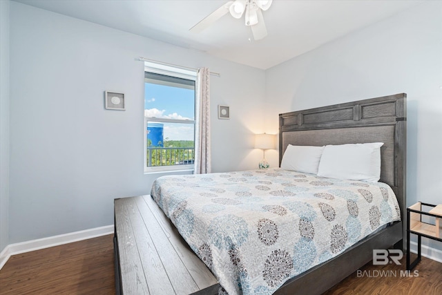 bedroom with baseboards, wood finished floors, and a ceiling fan