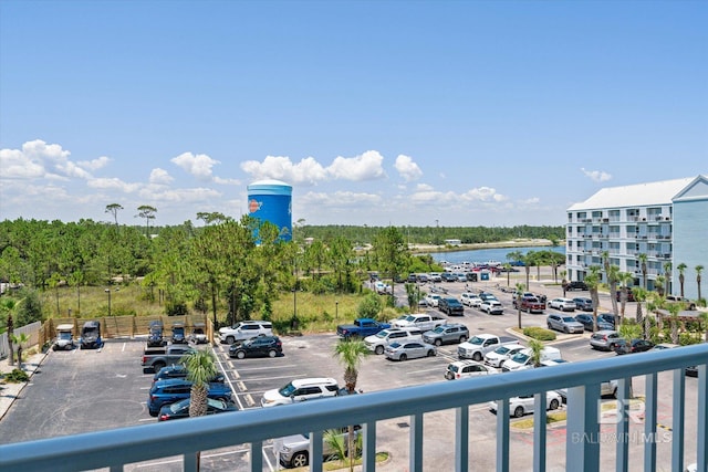 balcony featuring a water view