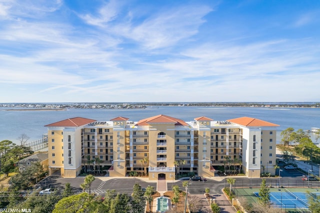 view of property with a water view