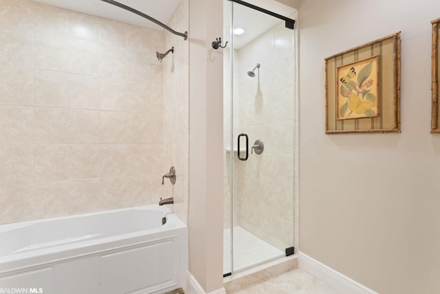 bathroom with tile floors and walk in shower