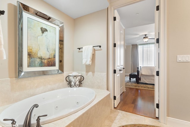 bathroom with wood-type flooring and ceiling fan