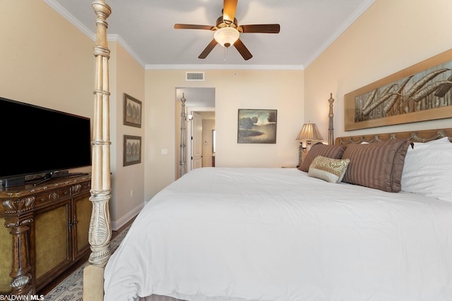 bedroom with ceiling fan and crown molding