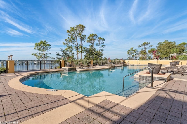 view of swimming pool featuring a patio