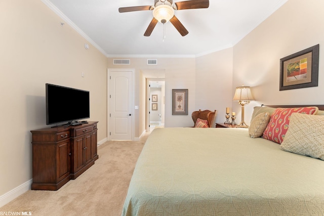 carpeted bedroom featuring ornamental molding and ceiling fan