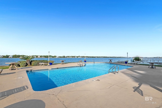 community pool featuring a patio area